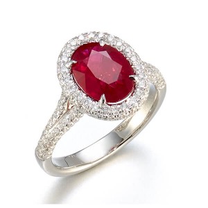 Estate Platinum Oval Ruby Diamond Halo Ring