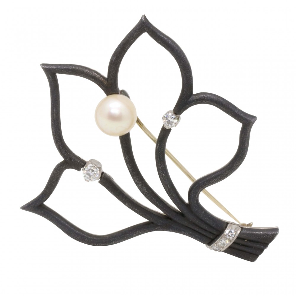 https://www.kernjewelers.com/upload/product/623-340-Estate-Marsh-Co-Black-Steel-Pearl-Flower-Brooch-side-view-scaled.jpg